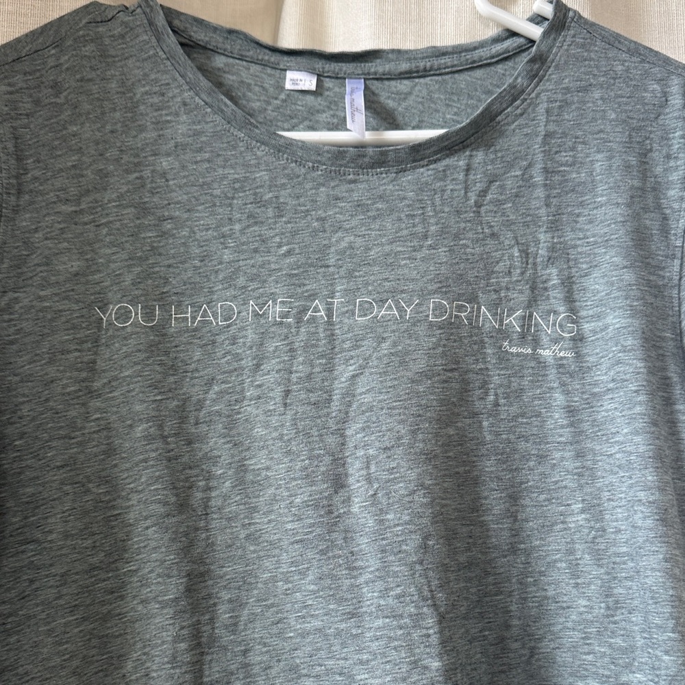 Women’s cropped Travis Mathew Tshirt.